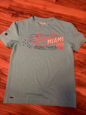 Lacoste Light Blue Miami Open 2022 Graphic Tee with Pink & Green Accents
